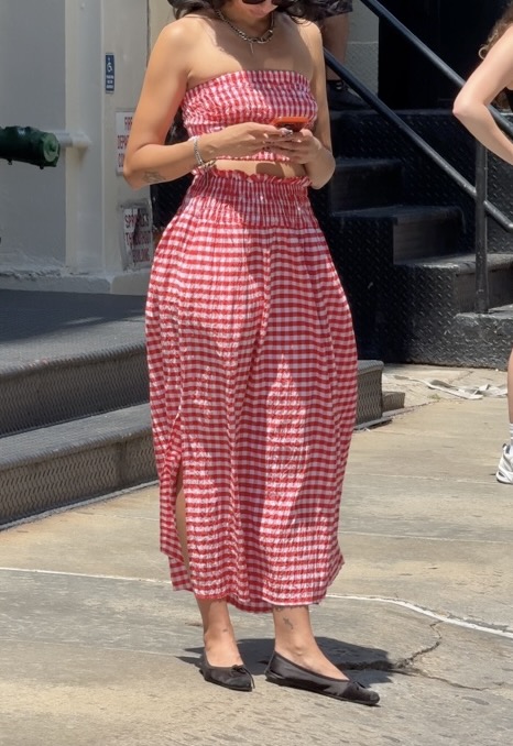 Red and white gingham tube top and matching midi skirt with black flats.